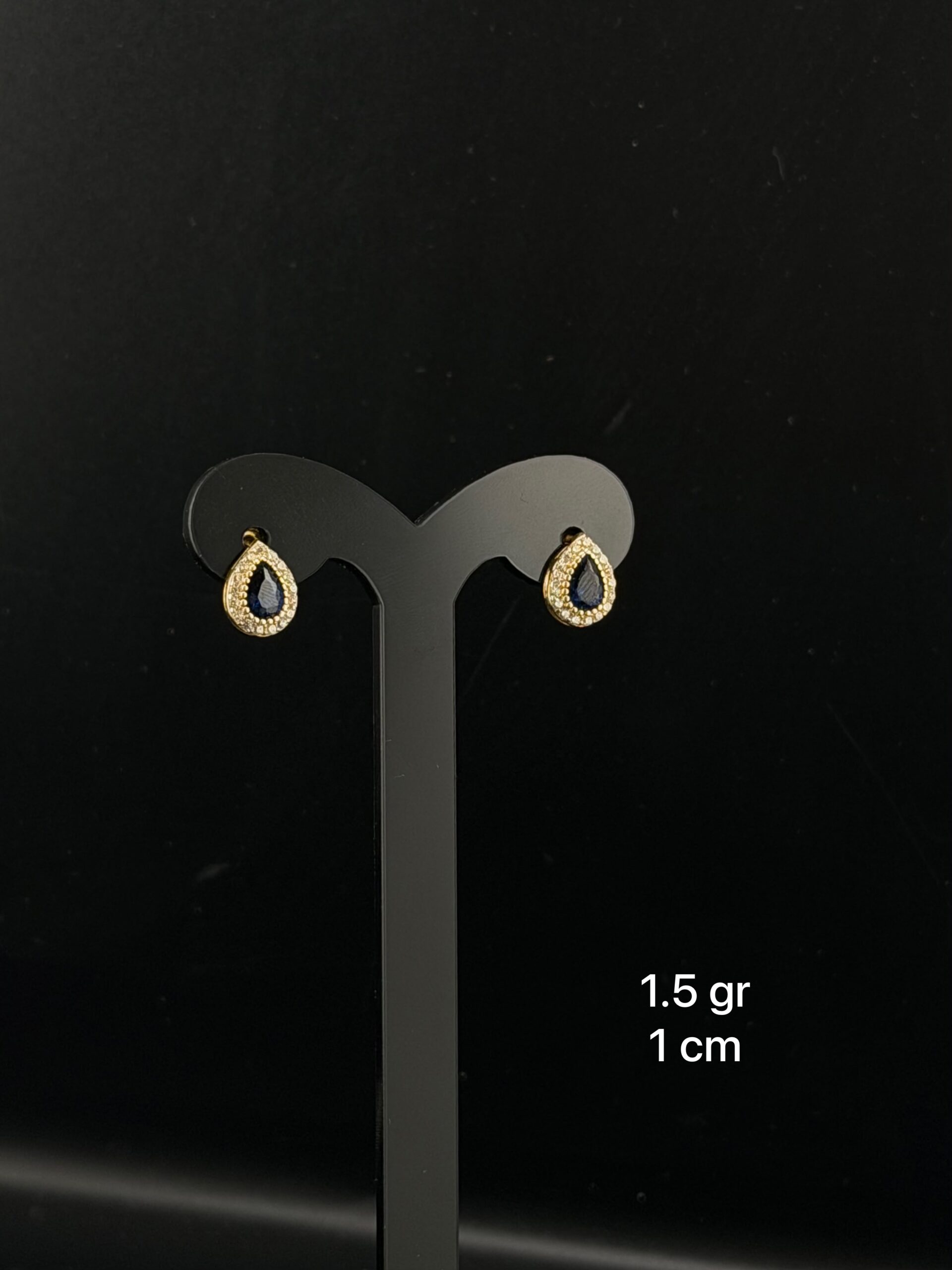 Arete con circonia color azul corte pera oro 10kilates